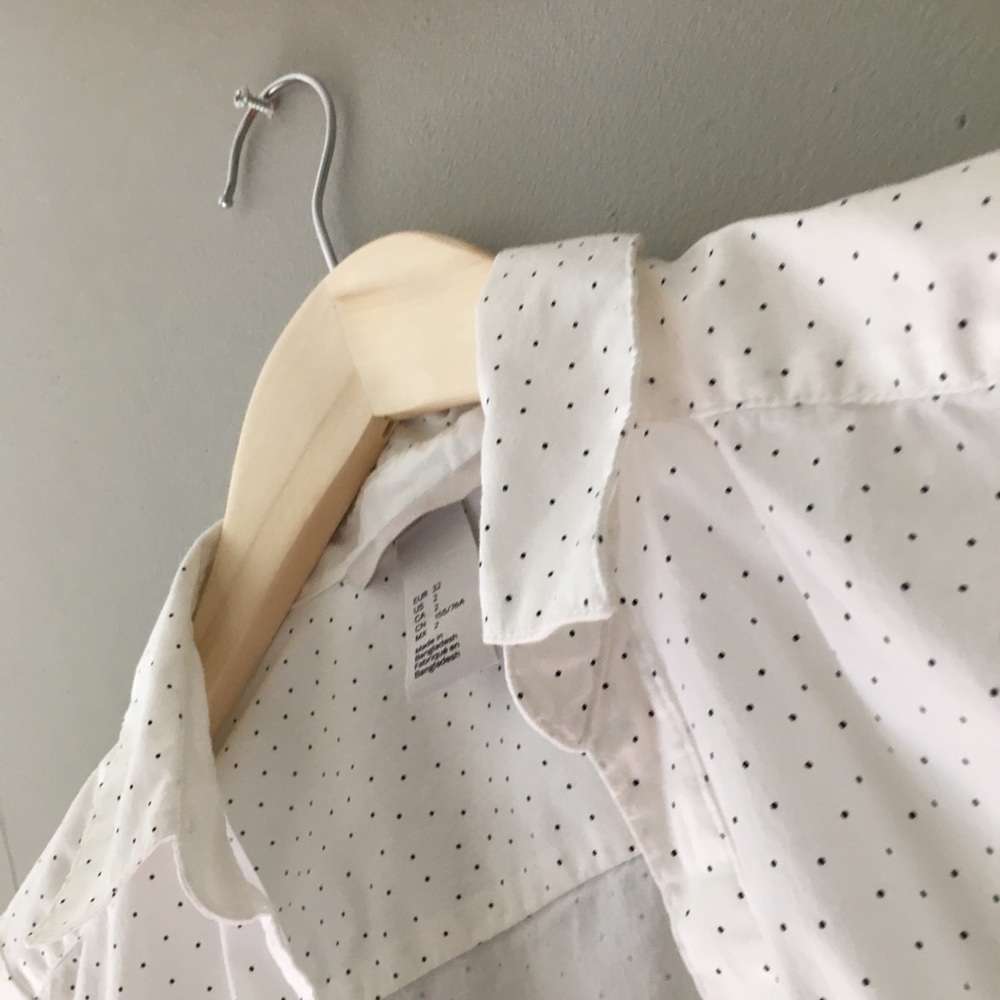 Crisp, pure white oxford, polka dots, size 2